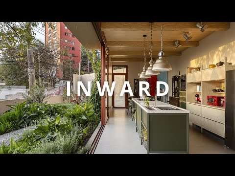 This Urban House Hides a Secret Garden Inside — And Keeps the City Out