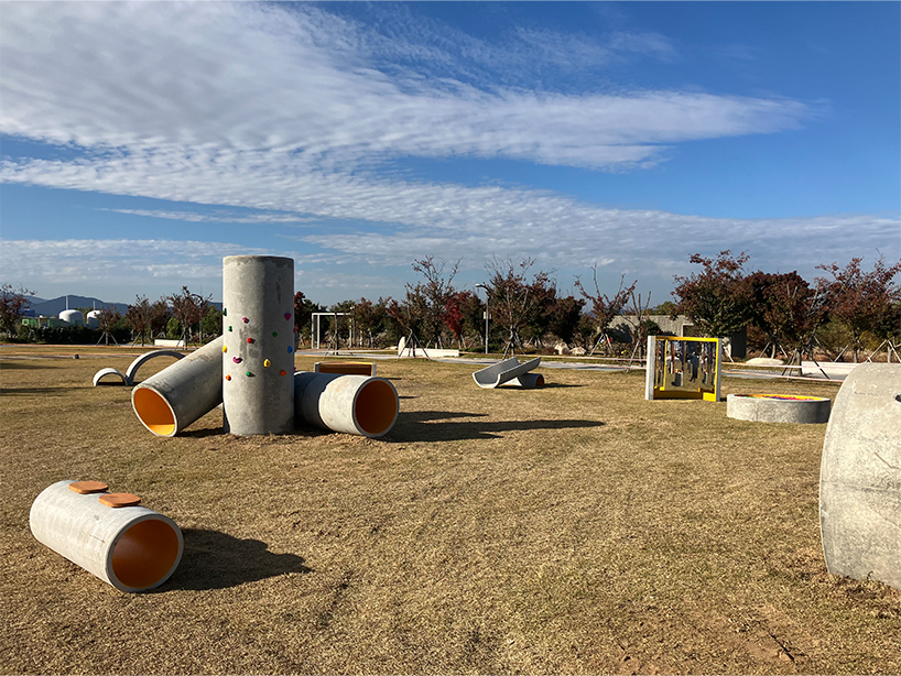 concrete utopia transforms discarded construction pipes into playground in south korea