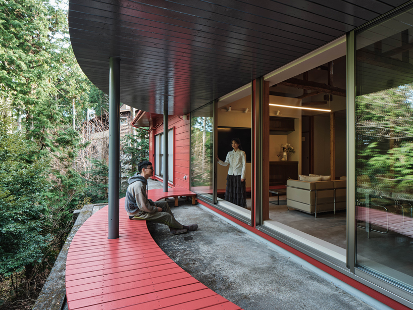 elevated circular veranda and canopy wrap 60-year-old restored japanese house