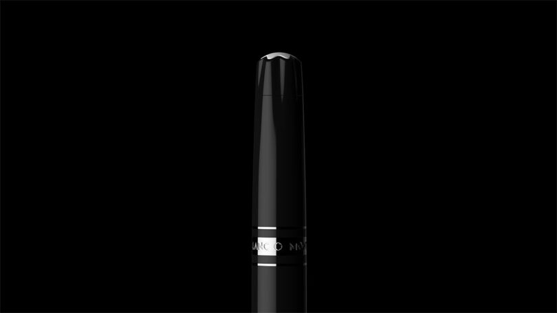A black fountain pen with silver accents, designed by Fuseproject, is shown vertically against a black background.