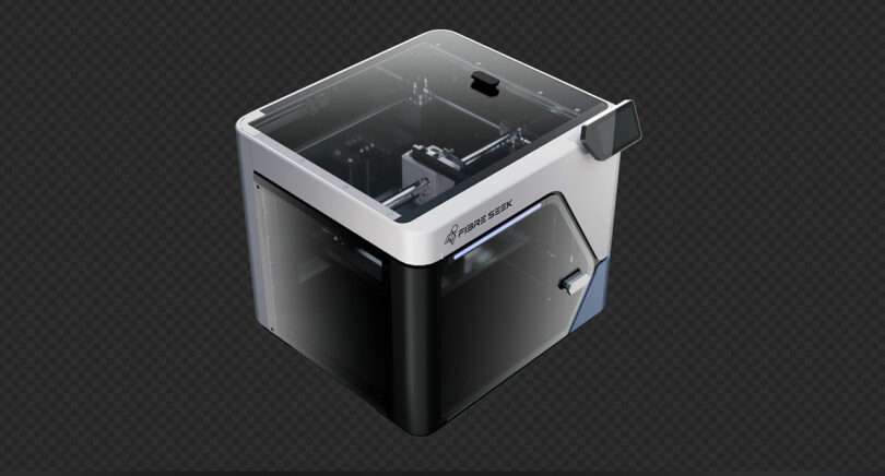 A FibreSeeker desktop 3D printer with a transparent enclosure and touch screen interface is shown on a plain background.