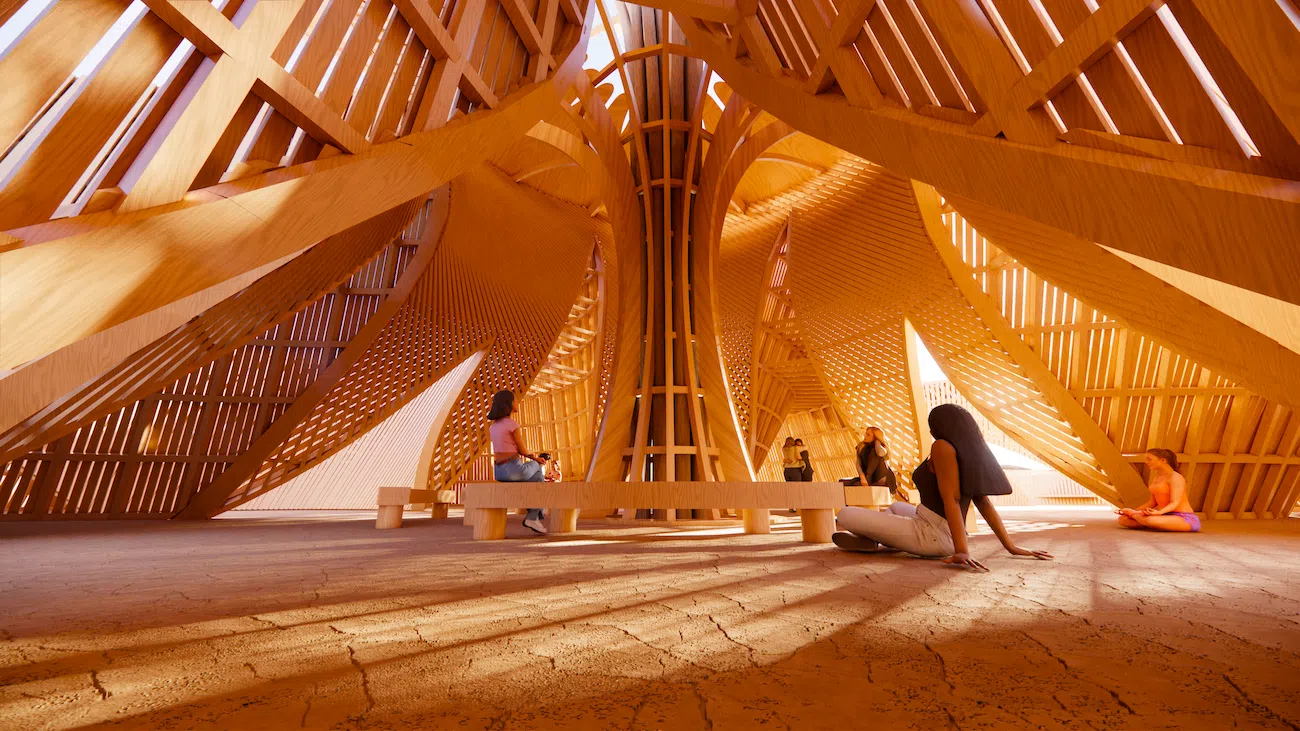 Temple of the Moon at Burning Man 2026 with petal-shaped timber walls and central flower structure.