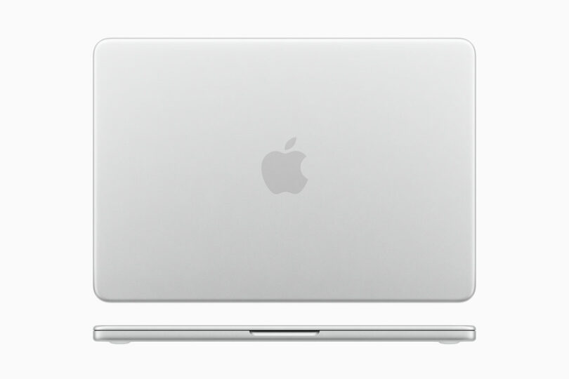 Closed silver Apple MacBook viewed from above, featuring the iconic Apple logo on the lid, with the laptop's front edge visible at the bottom.