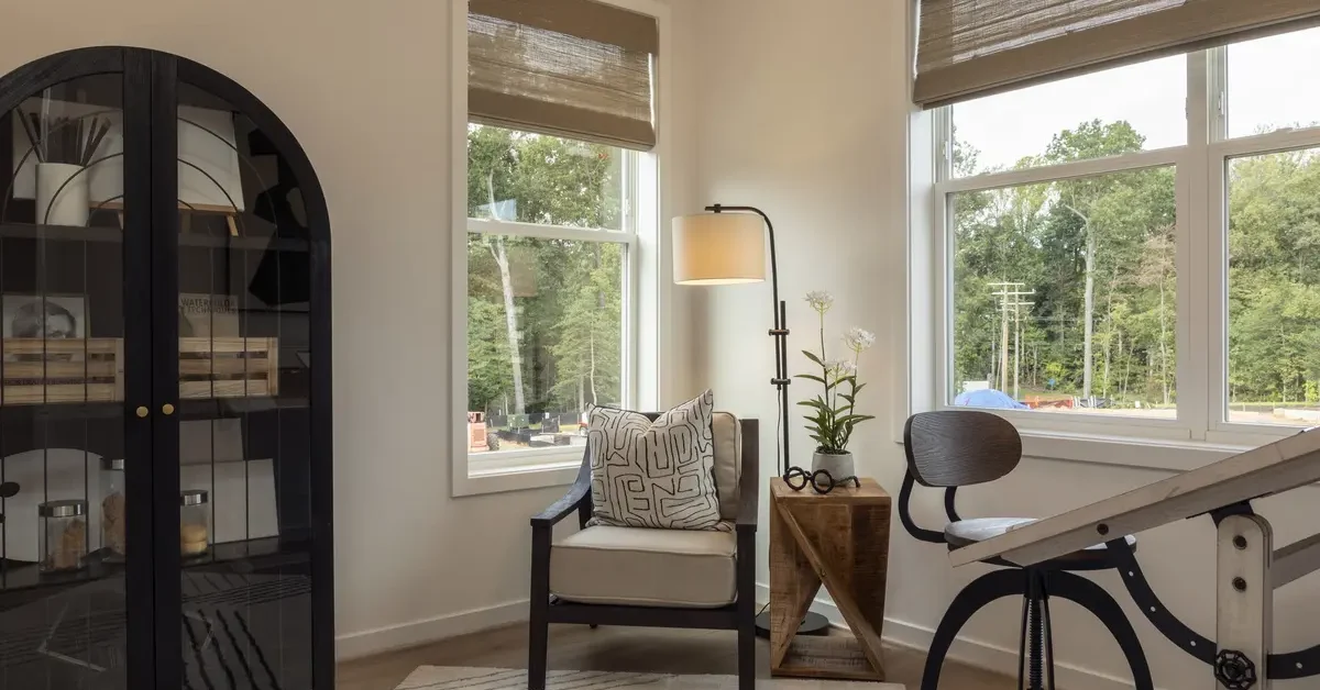 A bedroom set an as office- simple decor- in the model townhome at Lake Anne Townes on October 3, 2024 in Reston Virginia.