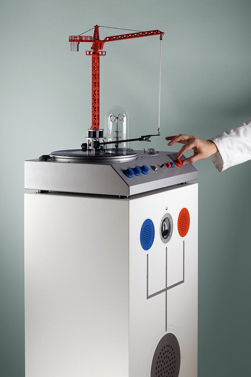 a bright red crane drives the needle in love hult&eacute;n's reimagined vinyl player - 2