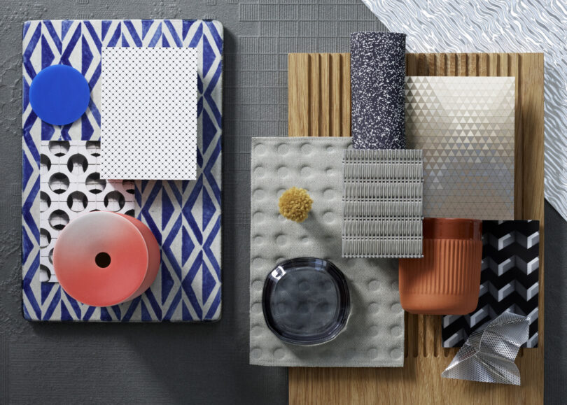 An arrangement of various patterned and textured materials, including fabric, wood, and plastic objects, displayed on a flat surface in a geometric composition inspired by the Friday 5 aesthetic.
