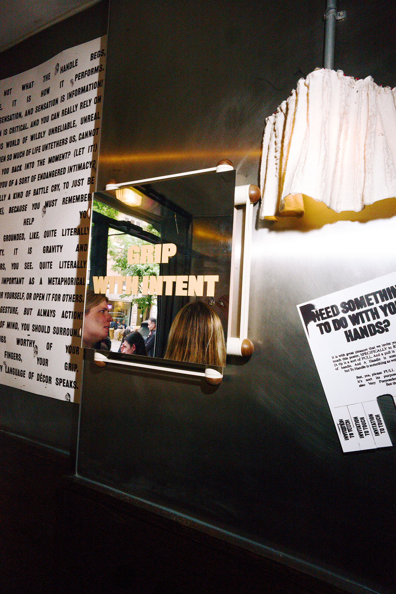 A wall mirror with the words 