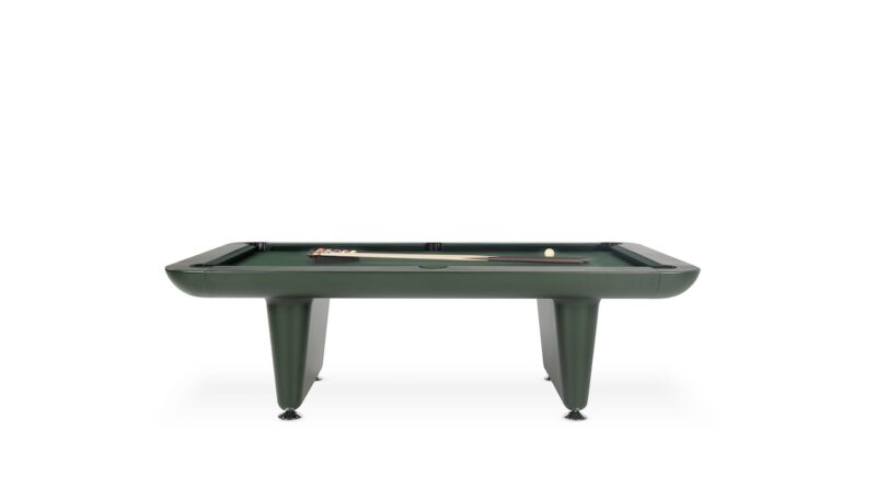 A modern green pool table with billiard balls, a cue stick, and a chalk placed on its surface, set against a plain white background.