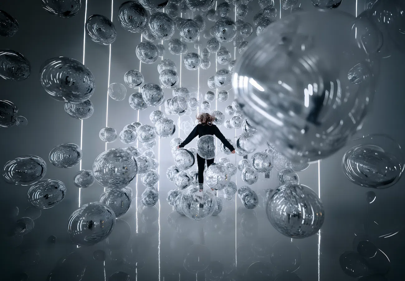 Woman with balloons.