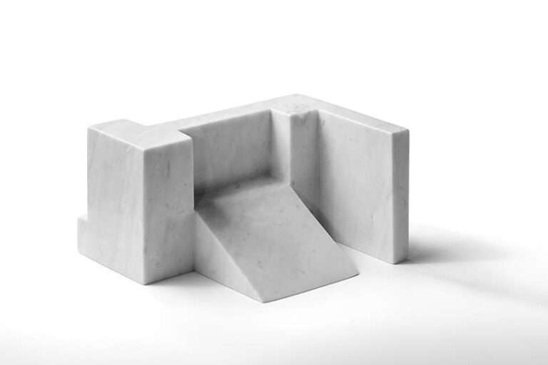carved from solid carrara marble, abstract house-like objects explore architectural form