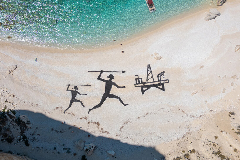 land art turns a greek beach into a scene of ancient hunters and modern extraction - 1