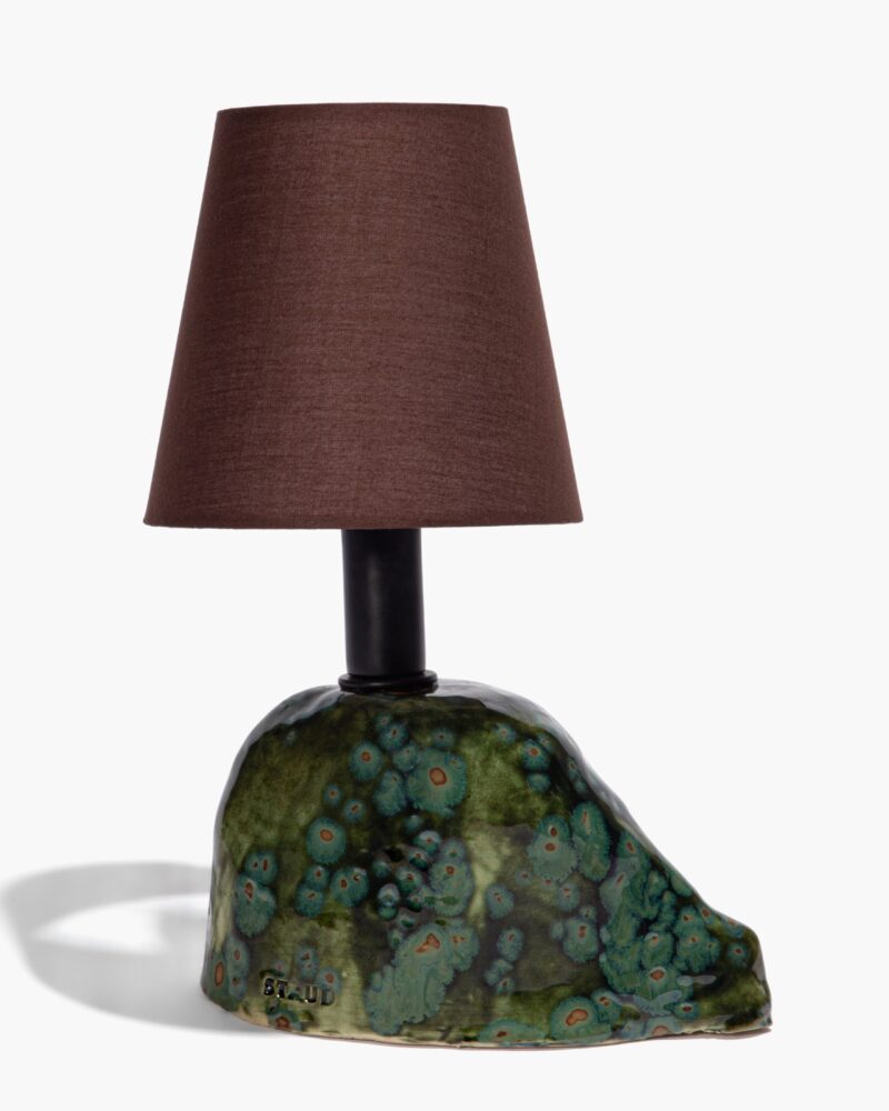Table lamp from Staud Home with a brown fabric shade and a ceramic base featuring a mottled green and blue glaze, photographed against a white background.