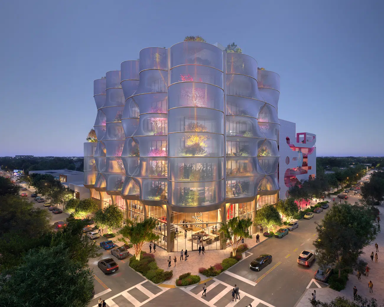 The veil both reflects exterior light and allows glimpses of the planting and offices within. Photo Credit: Sn&oslash;hetta / PLOMP