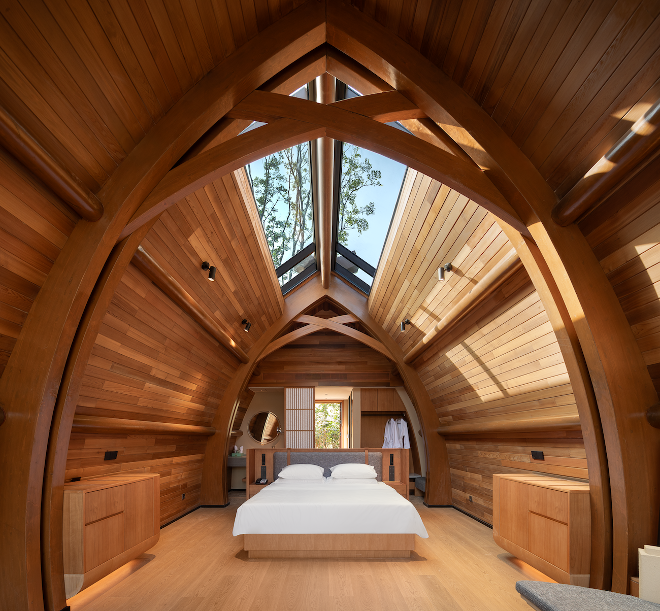 Photo of wood paneled hotel room.