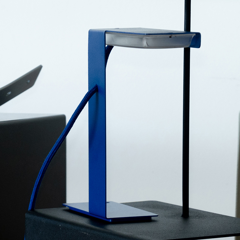 single sheet of folded steel sculpts into z-shaped table lamp - 4