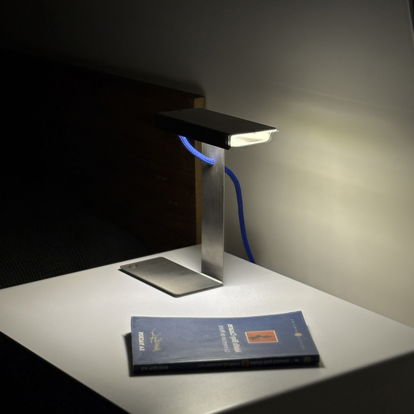 single sheet of folded steel sculpts into z-shaped table lamp - 5
