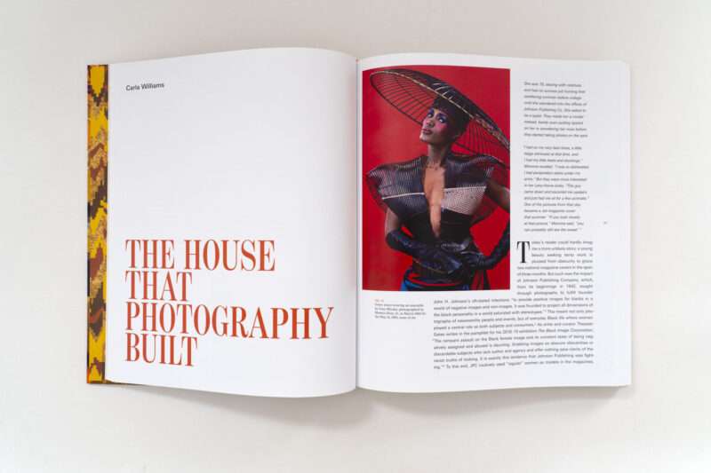 A two-page spread titled “The House That Photography Built” featuring a 1985 photograph of Grace Jones in a wide-brimmed hat, with an article by Carla Williams from 820 Ebony/Jet.