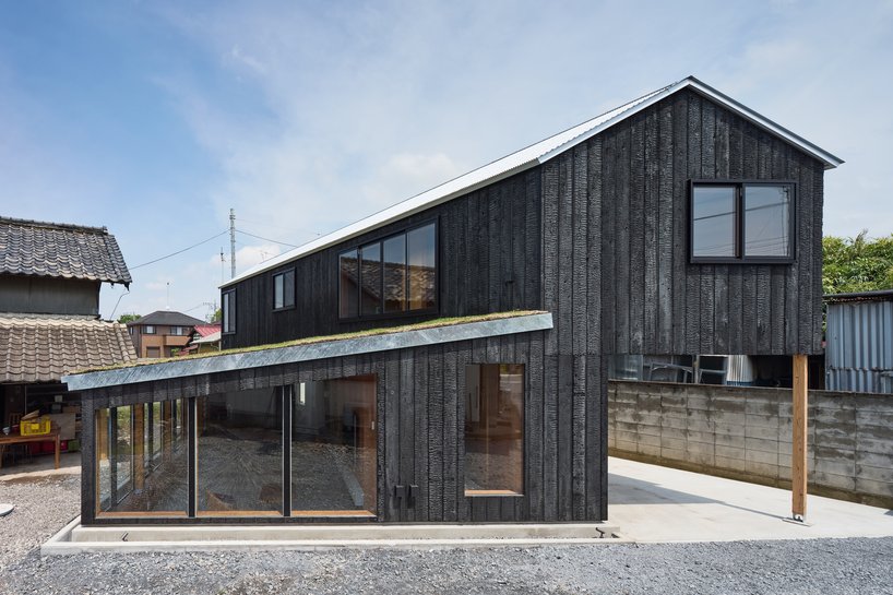 planted roof extends garden over tato architects’ timber house in mibu, japan - 3