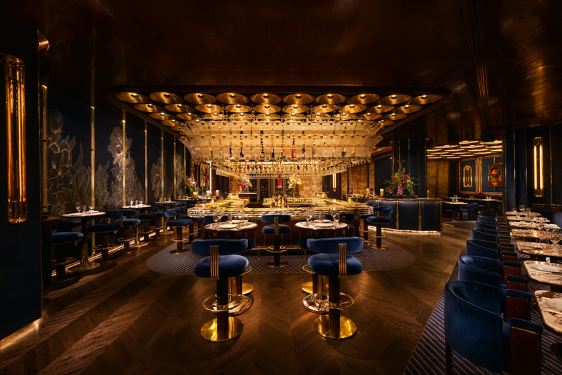 sculptural brass petals and silk embroideries detail isabel mayfair restaurant in abu dhabi - 1